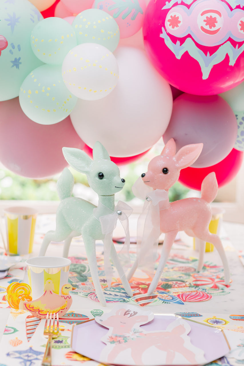Pastel deer decorations for a cute kitschy themed Christmas party.