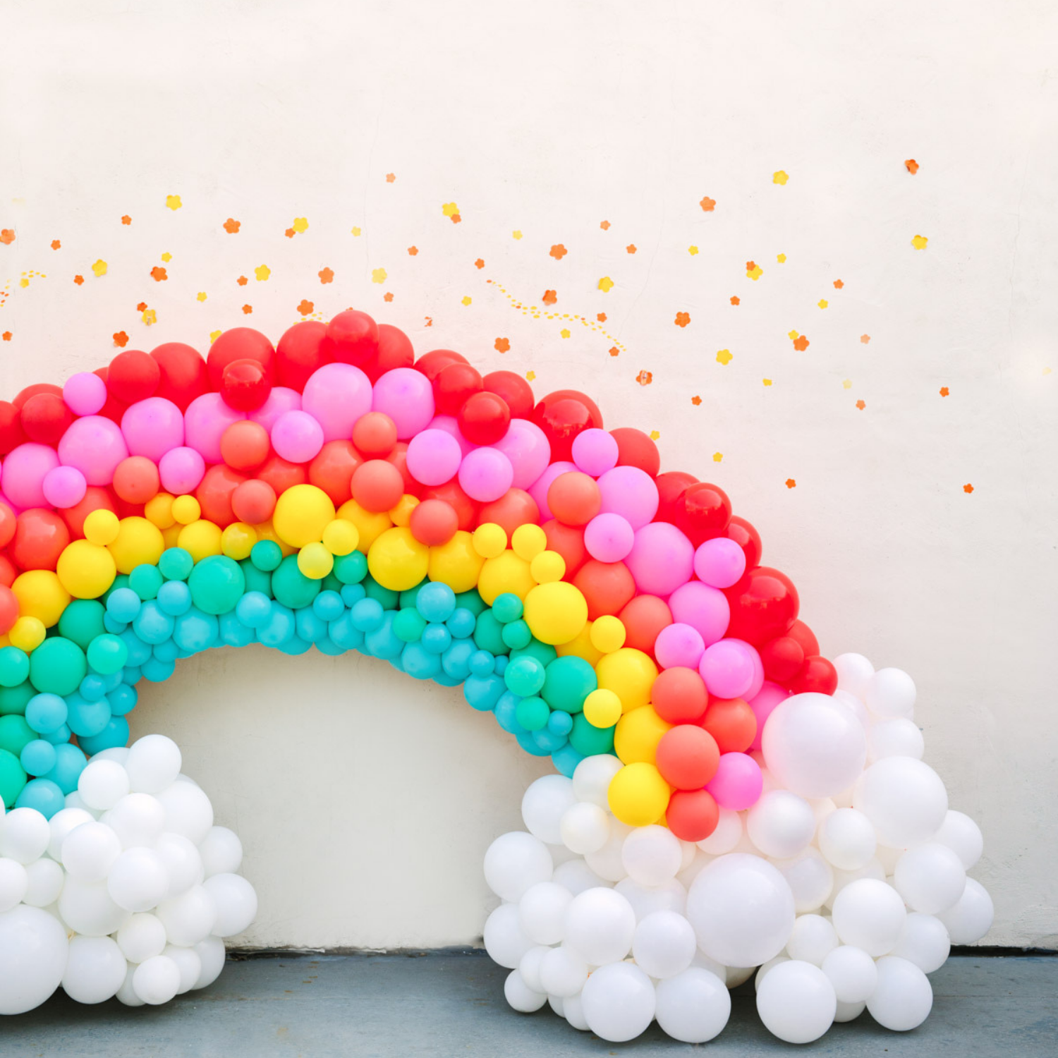 Rainbow balloon arch decoration. 