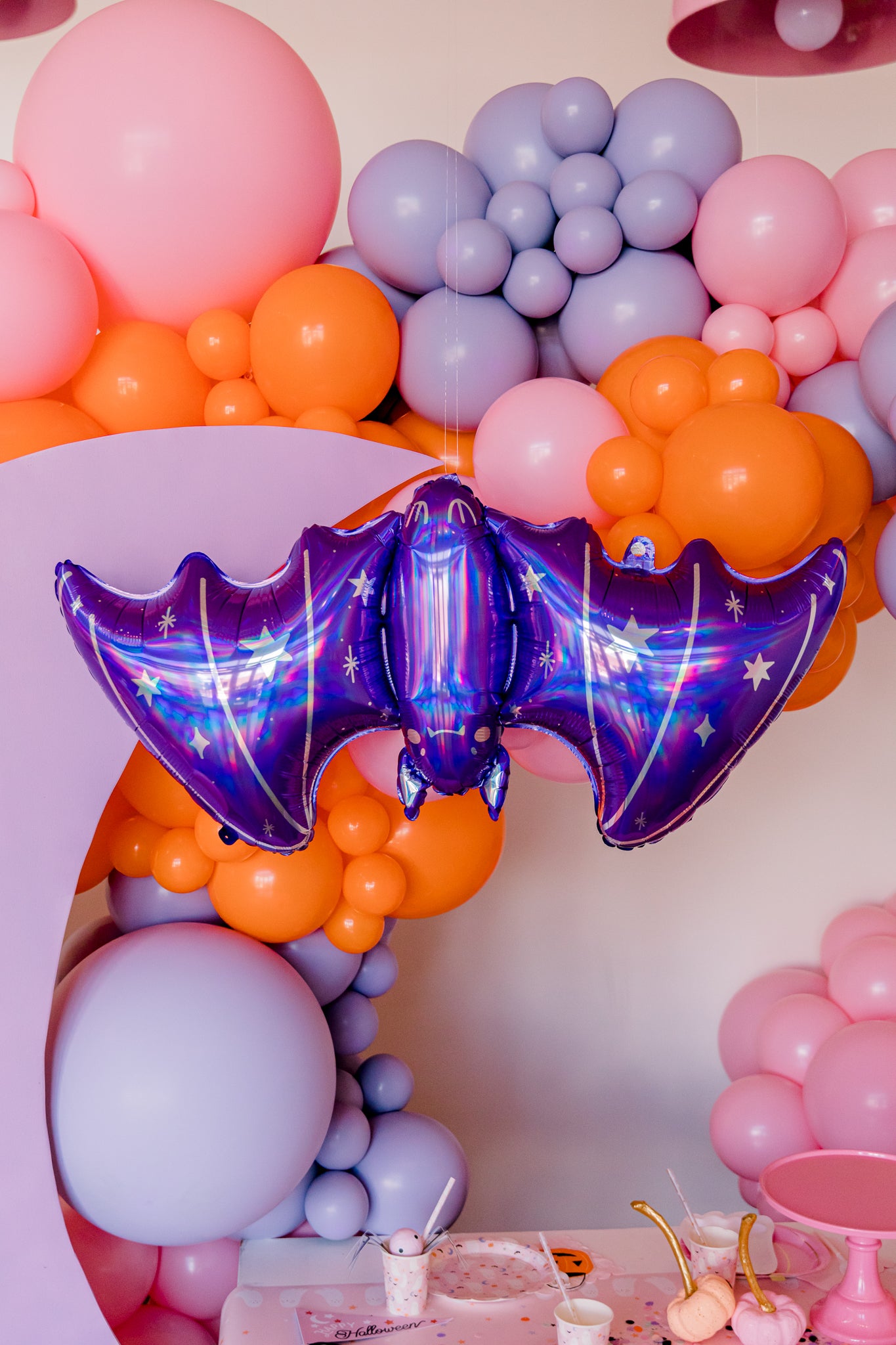 Purple bat balloon for a pastel Halloween party.