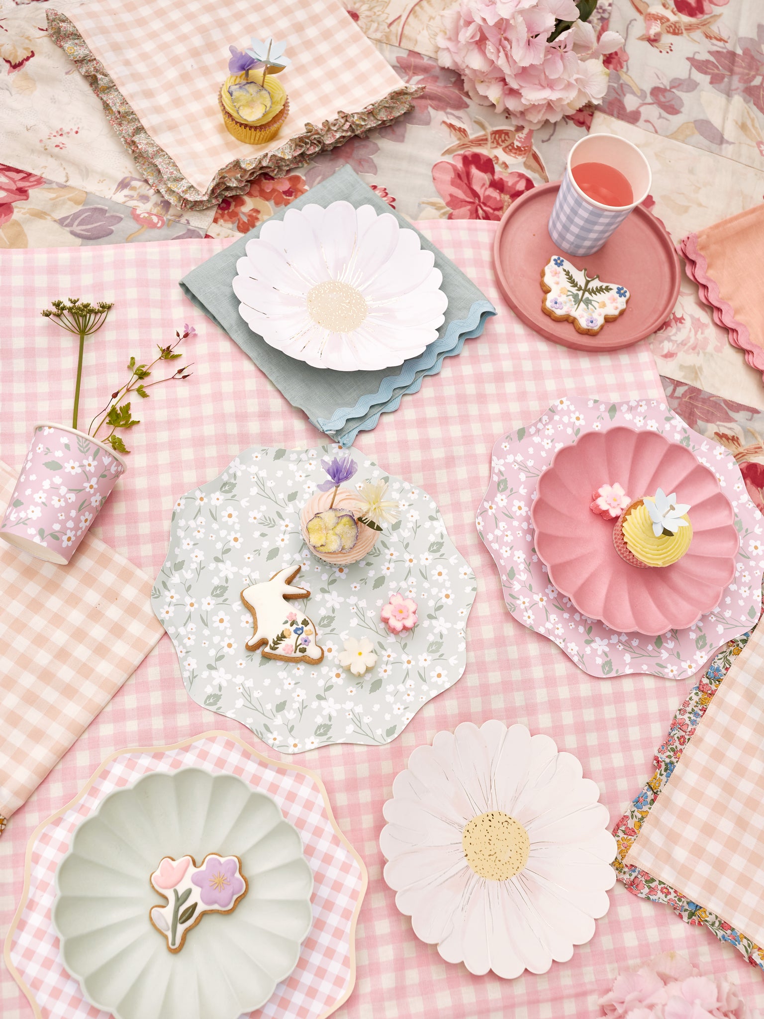 Daisy party supplies and pastel party supplies for a Spring tea party.