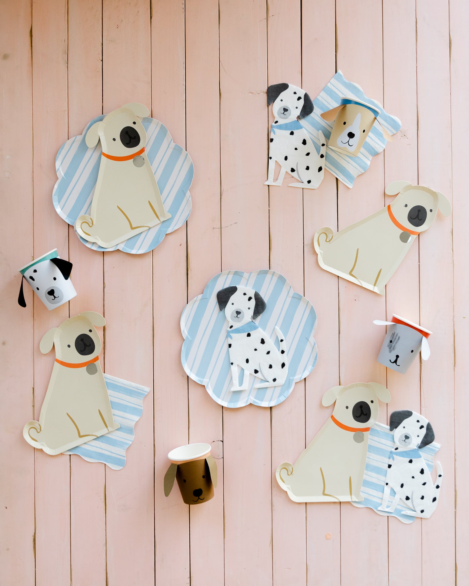 Puppy-themed party supplies for a puppy birthday party. 