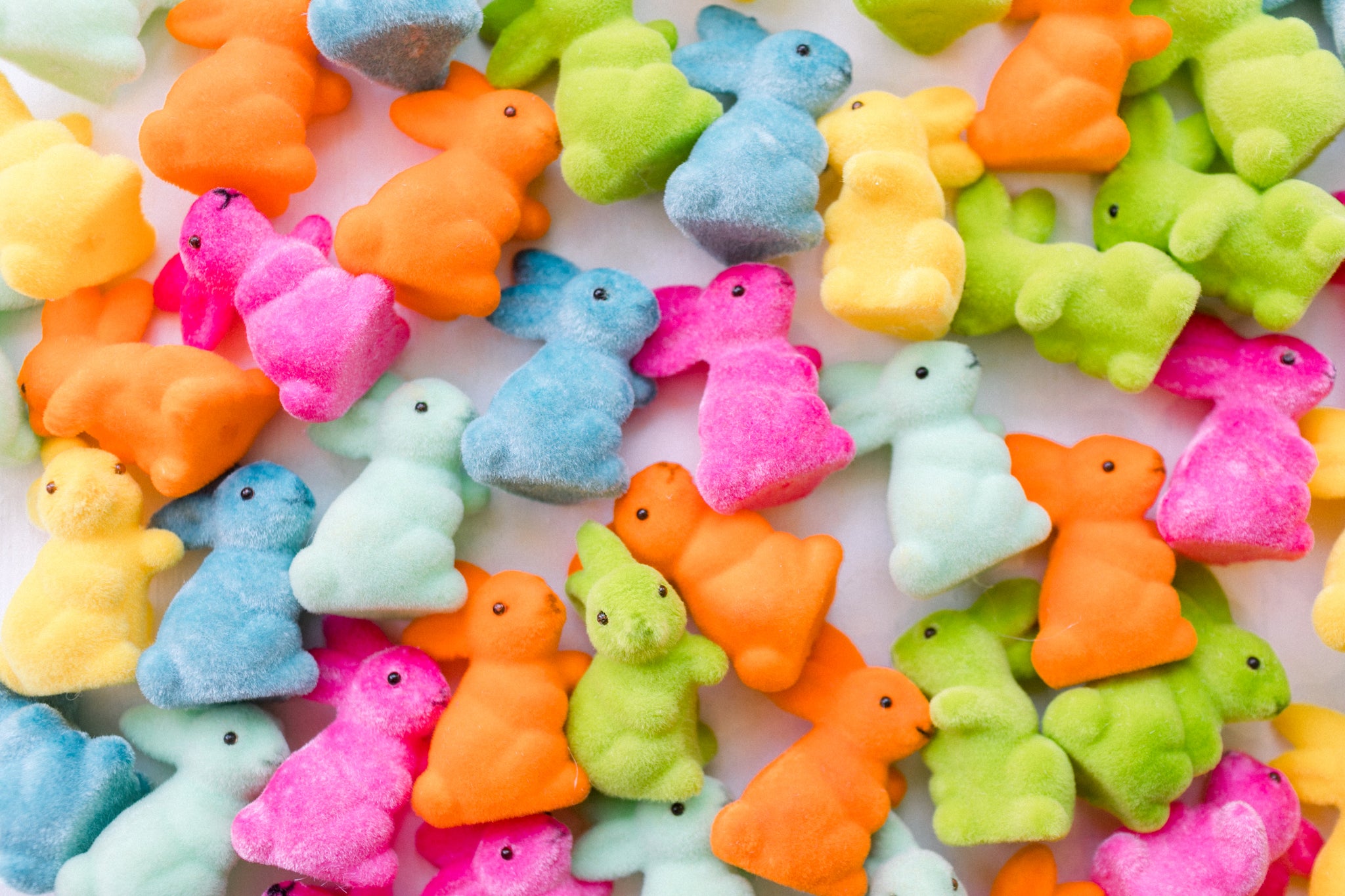 Mini flocked Easter bunnies to use as a fun kid's Easter basket stuffer. 