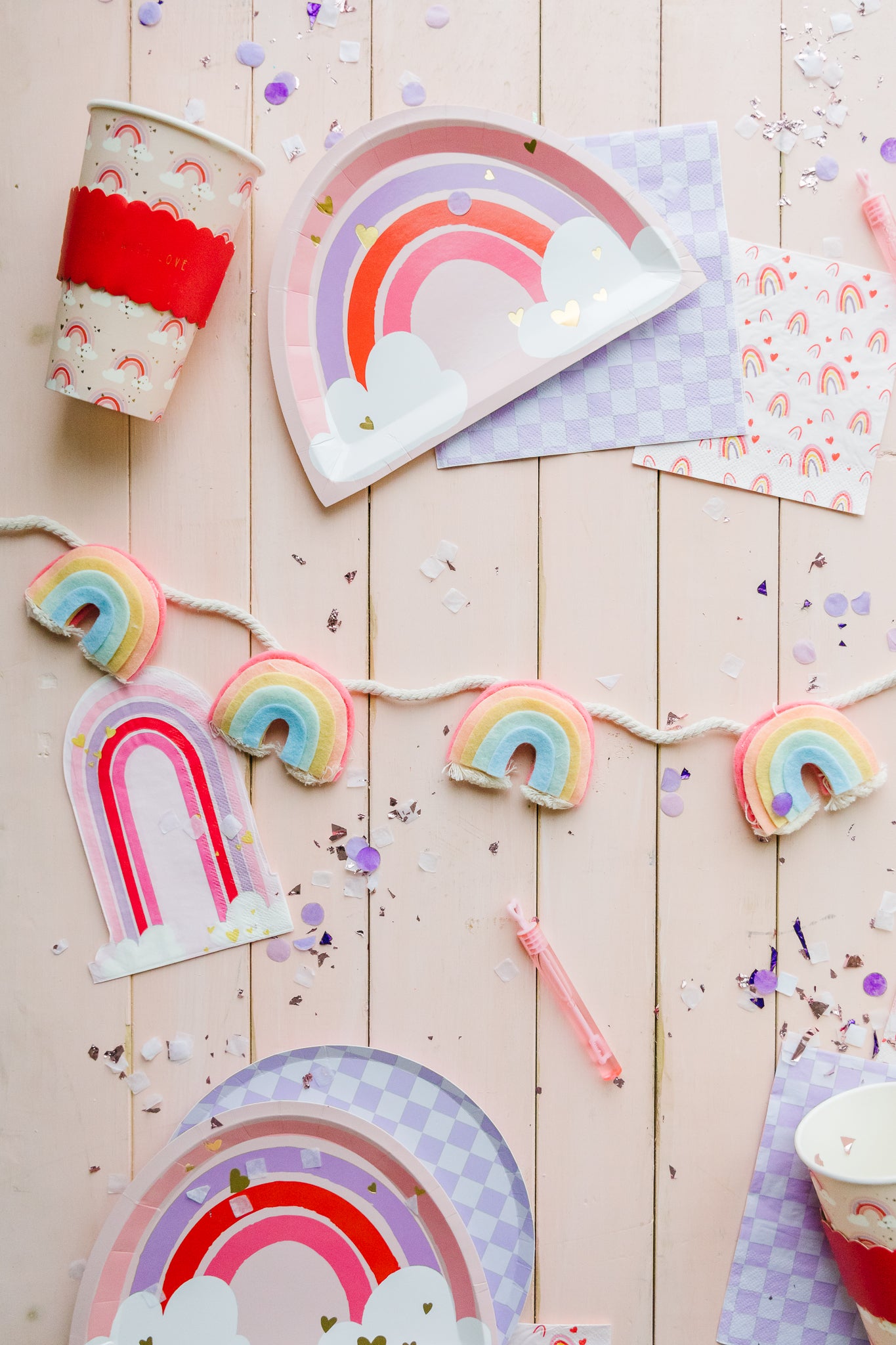 Pastel rainbow party supplies for a pastel rainbow theme party. 
