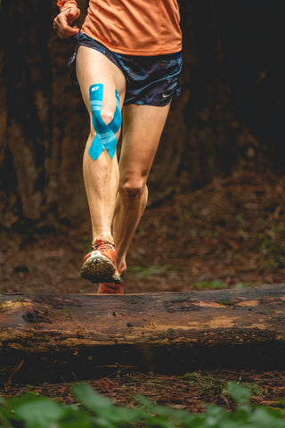 woman running in forest