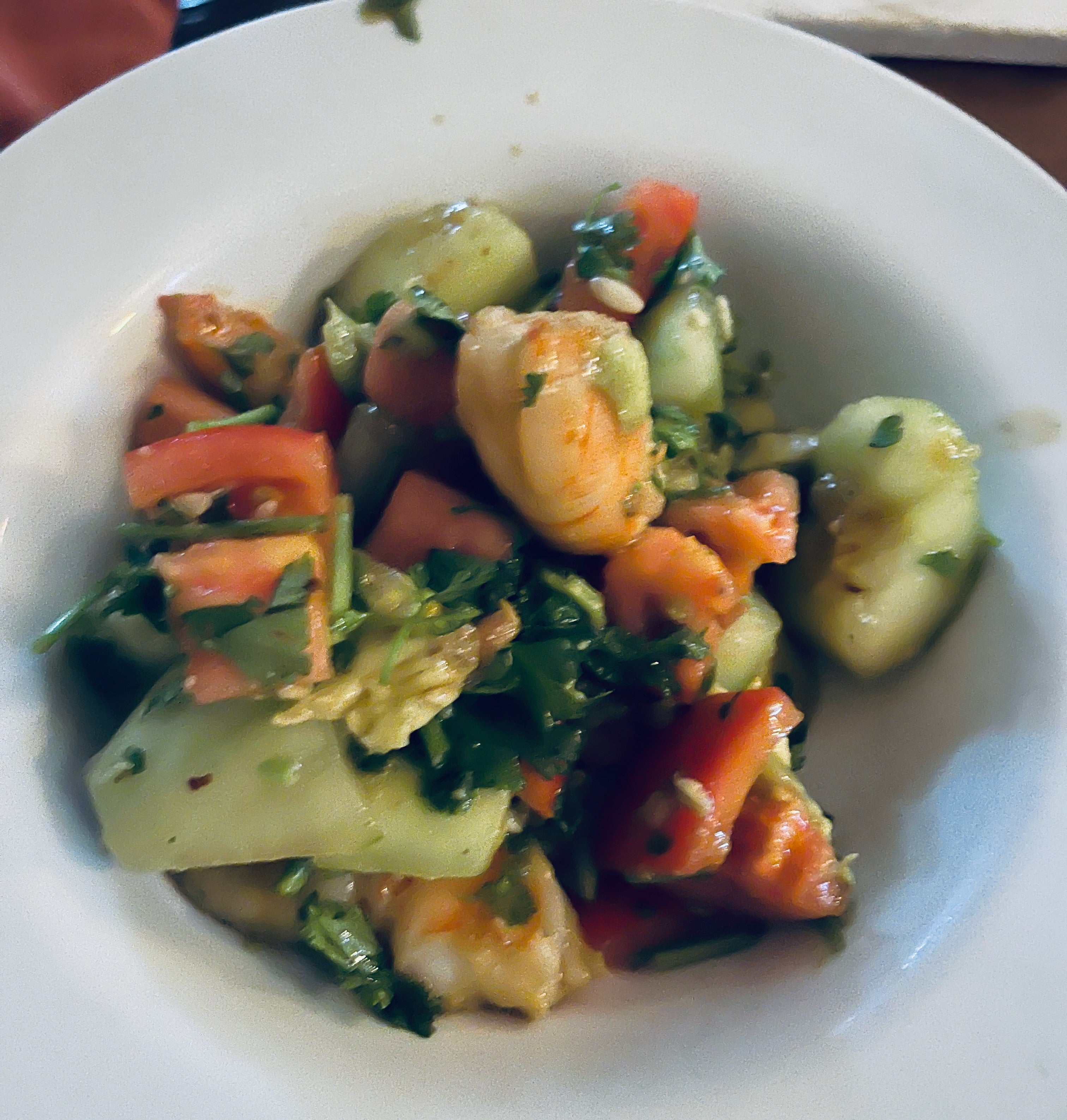 dish of avocado, cucumber, tomato, shrimp salad