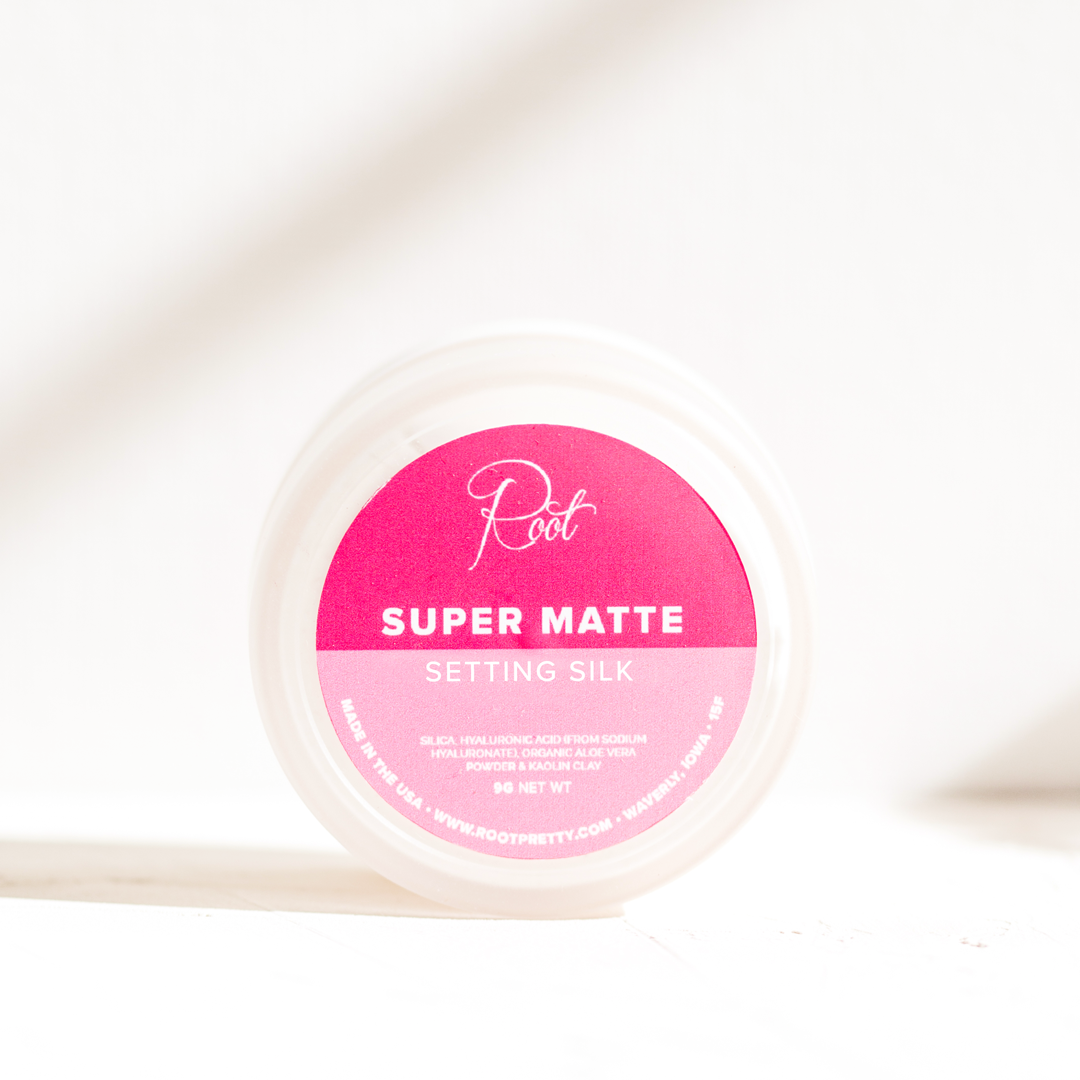 Container of Root Super Matte Setting Silk with pink label.