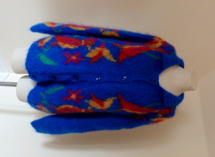 Bright blue mohair cardigan with exotic birds