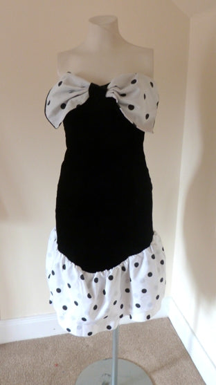 80s black velvet dress with polka dot bow and bustle 