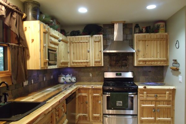 A set of wooden epoxy countertops located in a cabin.