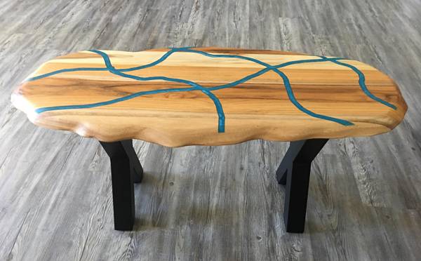 An abstract wooden epoxy coffee table.