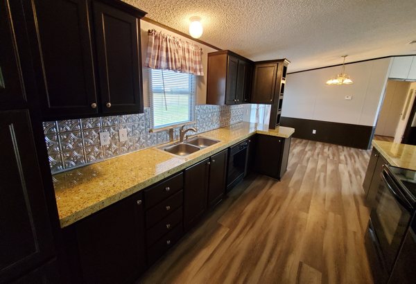A newly renovated kitchen with a set of epoxy countertops.