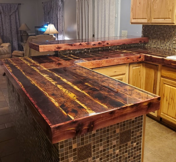 An epoxy kitchen countertop with a smooth, crystal-clear finish.