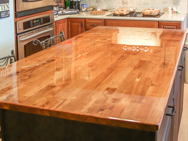 A wooden epoxy kitchen island countertop.