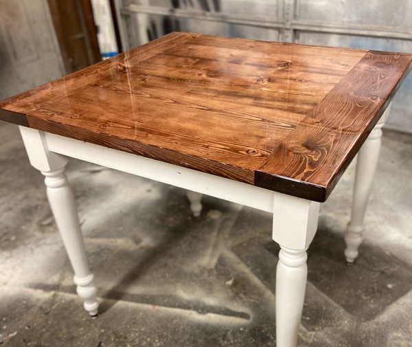 A wooden epoxy taable top.