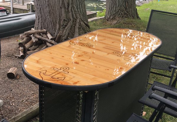 An outdoor wooden epoxy table top.