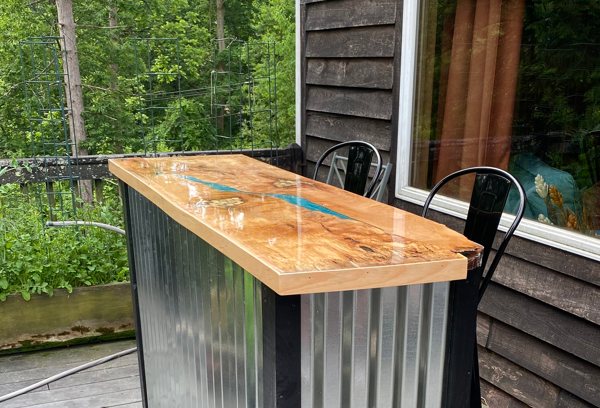 An outdoor wooden epoxy countertop.