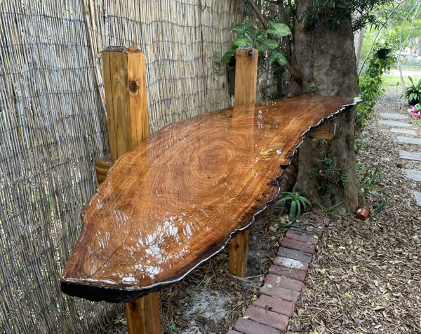 An outdoor wooden epoxy bar top.