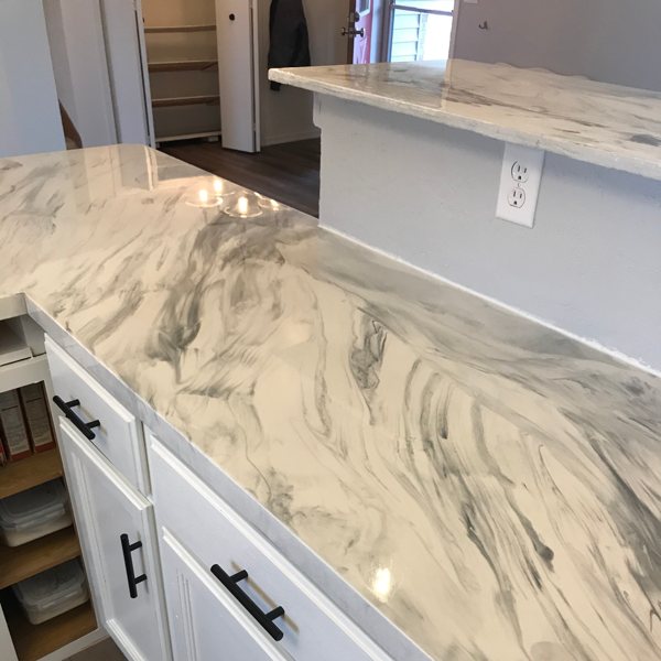 An epoxy countertop with a marble surface.