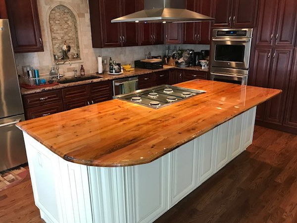 A kitchen with beautiful epoxy countertops.