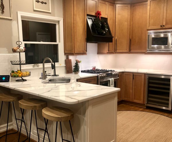 A kitchen with a full set of epoxy countertops.