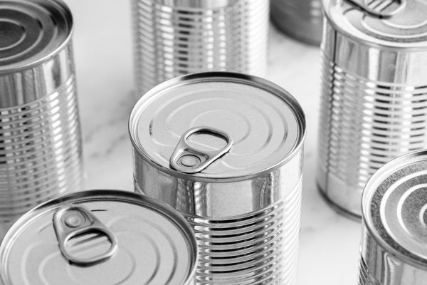 A photo of various sealed canned goods.