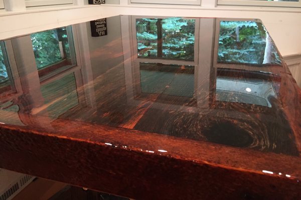 A relatively close view of a wooden epoxy table top.