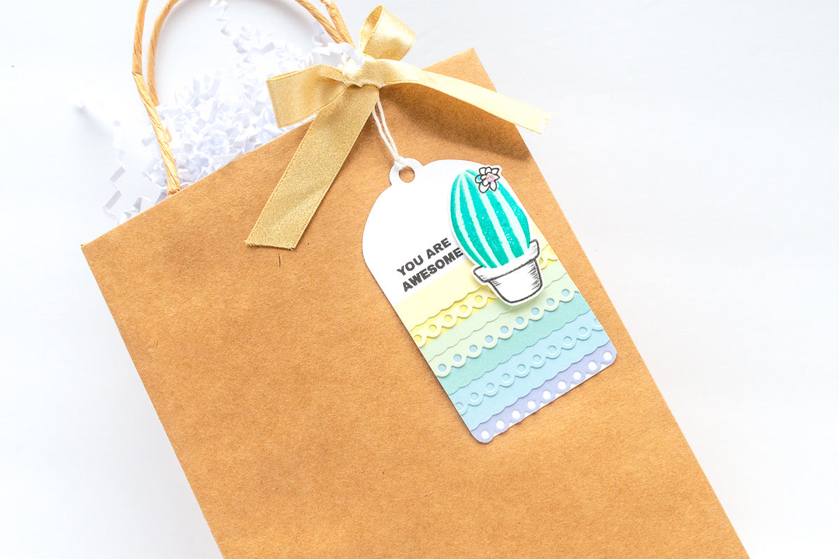 DIY gift bag with a cute tag, decorated with Altenew mini stamp and die set