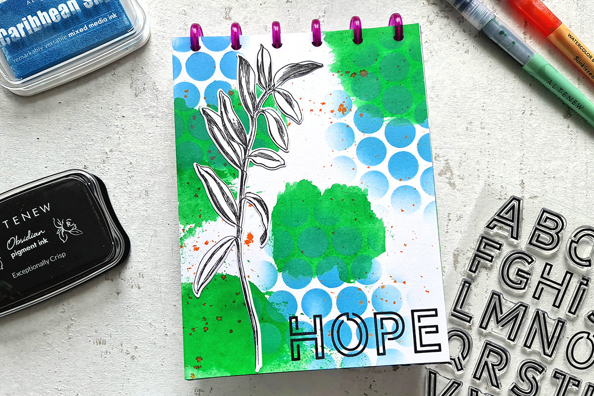 A "hope" journal entry with a faux bokeh effect created with stencils and ink blending brushes