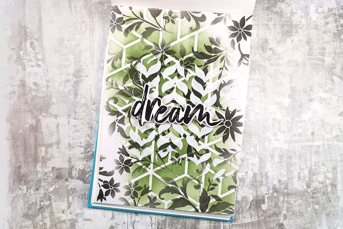 A "dream" card with a green stenciled background made with ink blending brushes