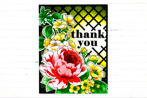 A thank-you card with a large red blossom as a focal point and a black-and-yellow trellis background