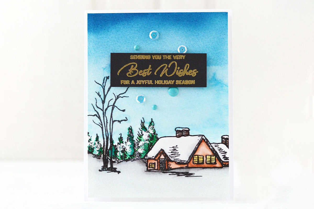 A "best wishes" winter card with a blended background depicting a sunset