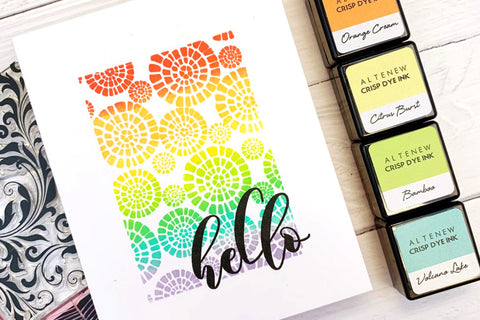 A greeting card with a fun, rainbow colored background created with mini cube inks and ink blending brushes