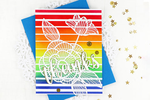 Rainbow ombre thank-you card with a flower silhouette/outline in the background