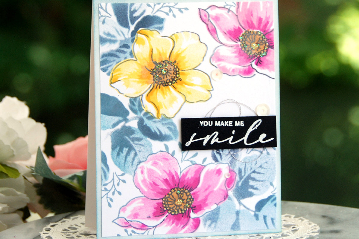 colorful floral handmade card featuring yellow and pink Japanese anemones