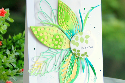 masculine handmade card with green leaf die-cuts and a sticker with a print that says "for you"