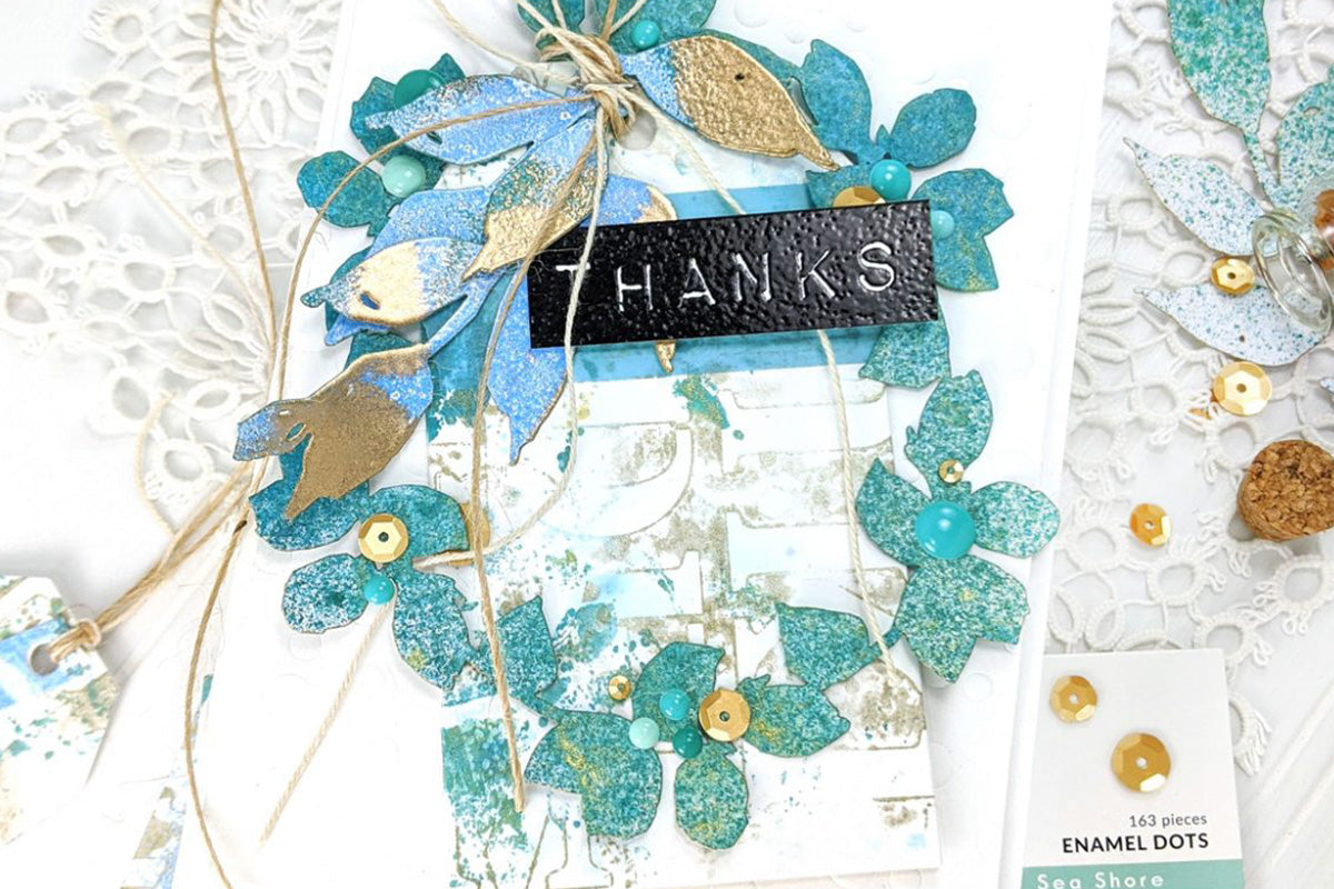 DIY thank you card with a sea-green and gold leafy wreath, decorated with metallic thread and gold sequins