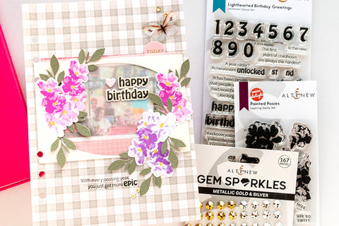 Scrapbook page decorated with Gingham background, florals, and cardmaking gems from Altenew