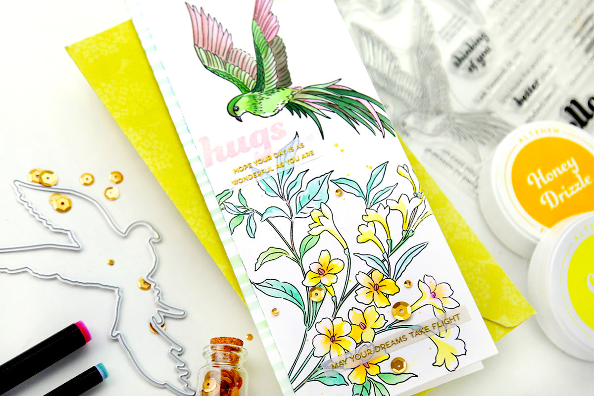 Slimline card idea with yellow tuberoses and a green and pink bird, made with Altenew's Build-A-Garden cardmaking set