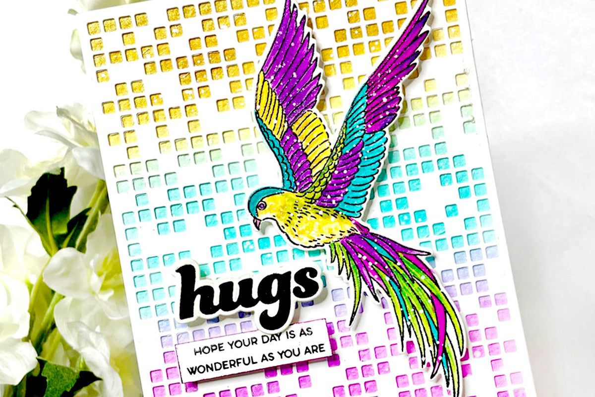 Rainbow greeting card with pixel grid background and a rainbow colored bird
