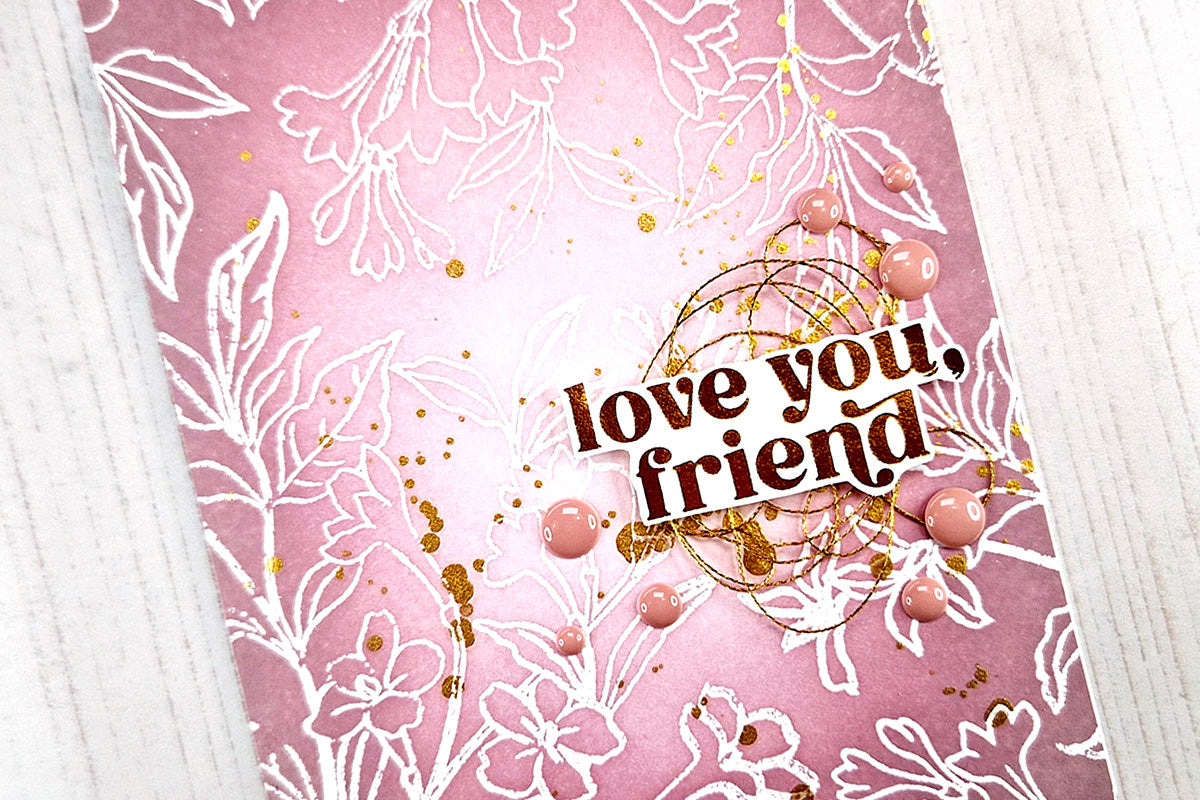 DIY greeting card for friends, with a pale pink emboss resist background and white embossed florals