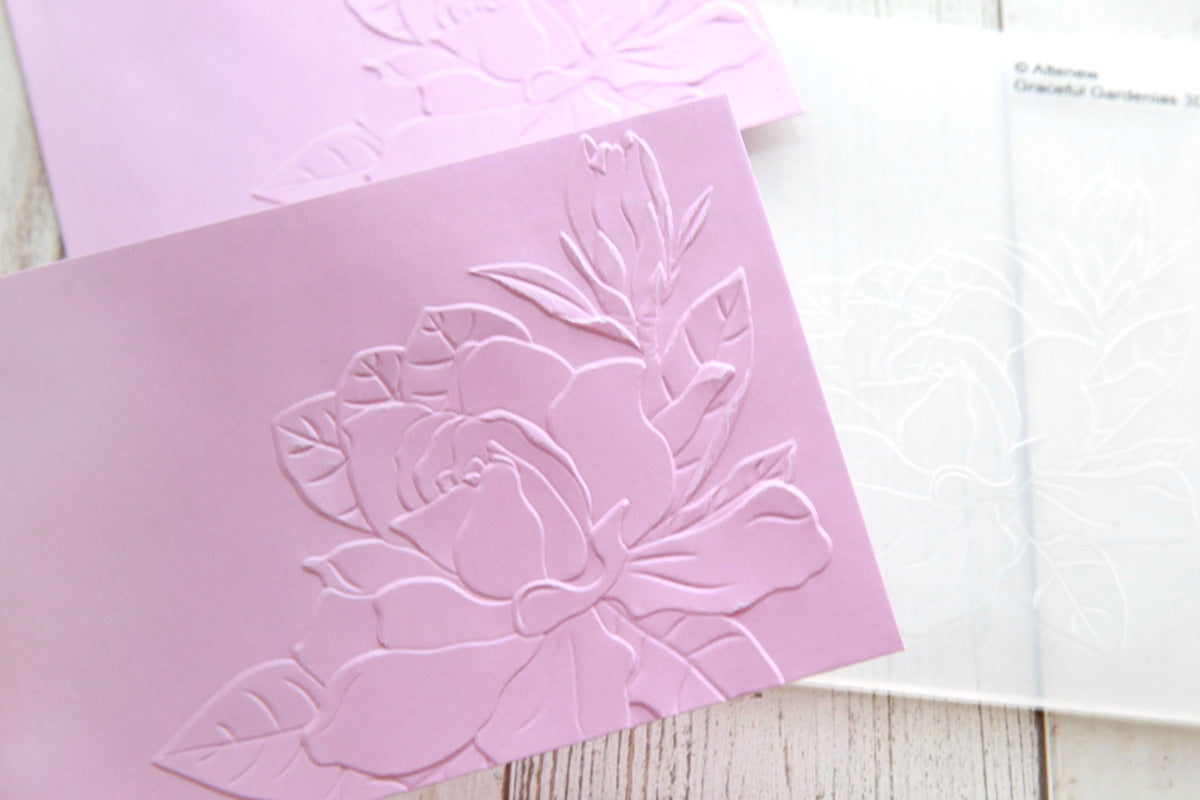 Pale pink envelopes decorated with 3D embossed flowers