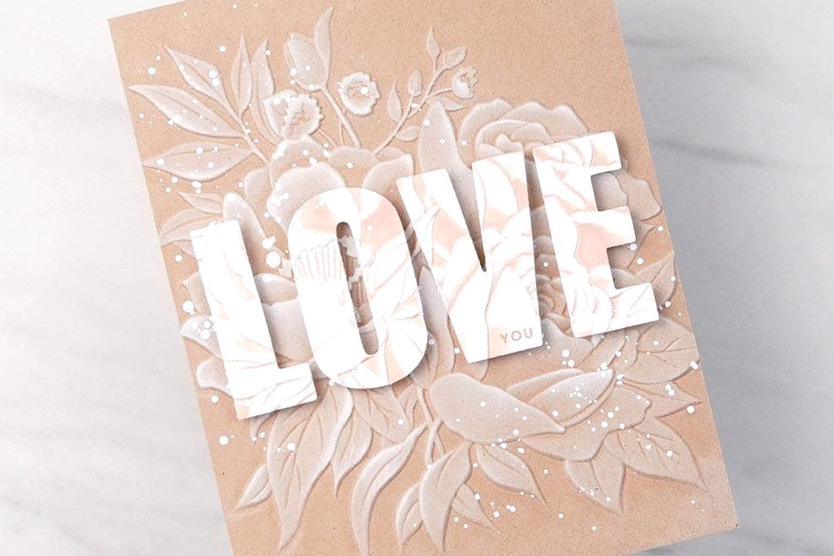 Valentine's Day card idea with 3D embossed flower arrangement and the word "love"