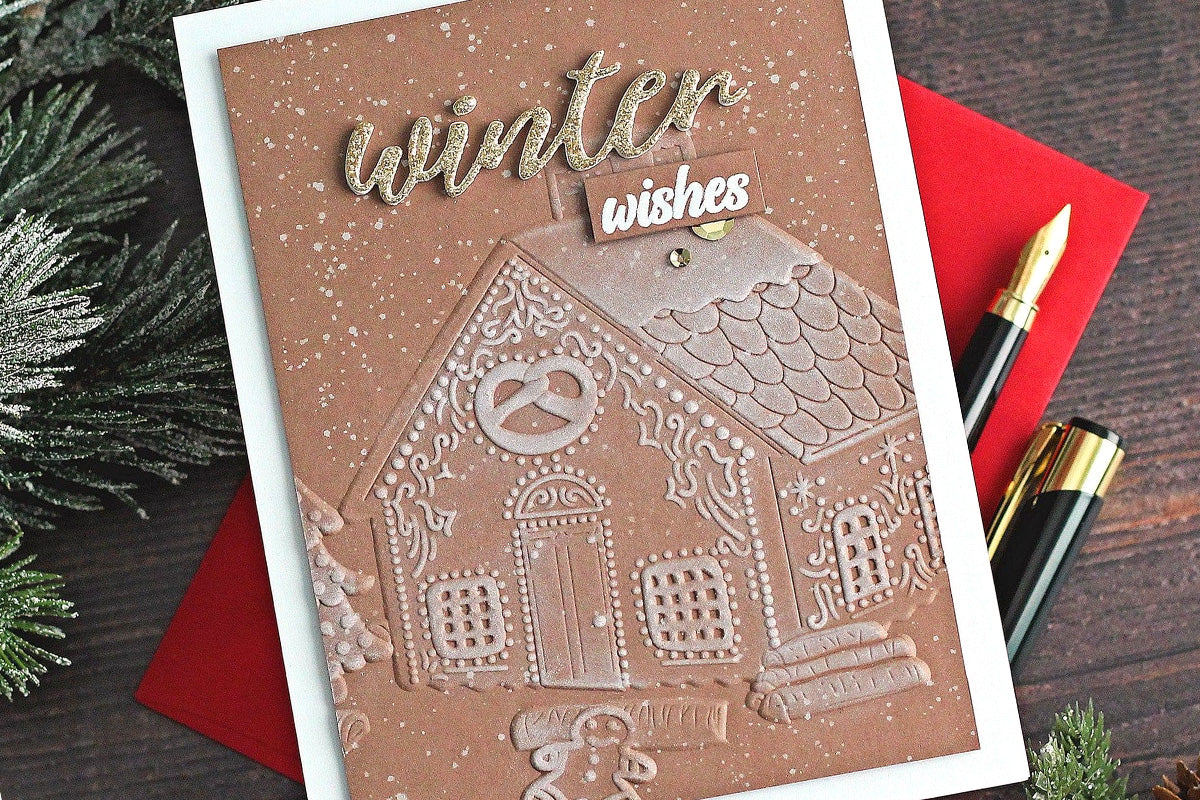 Cute Christmas card with a 3D embossed gingerbread house design