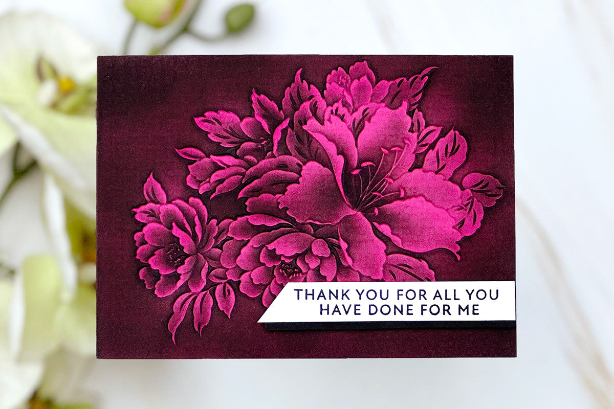 Bold and dramatic pink floral handmade card with 3D embossed flowers
