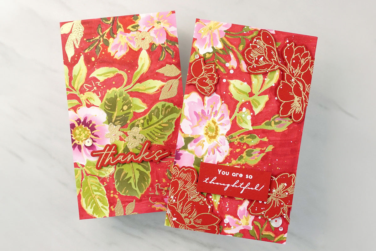 2 handmade thank you cards with stencil flower art in the background