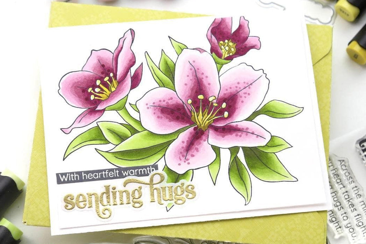 A "sending hugs" card with a floral focal point created with Altenew's Artist Alcohol Markers