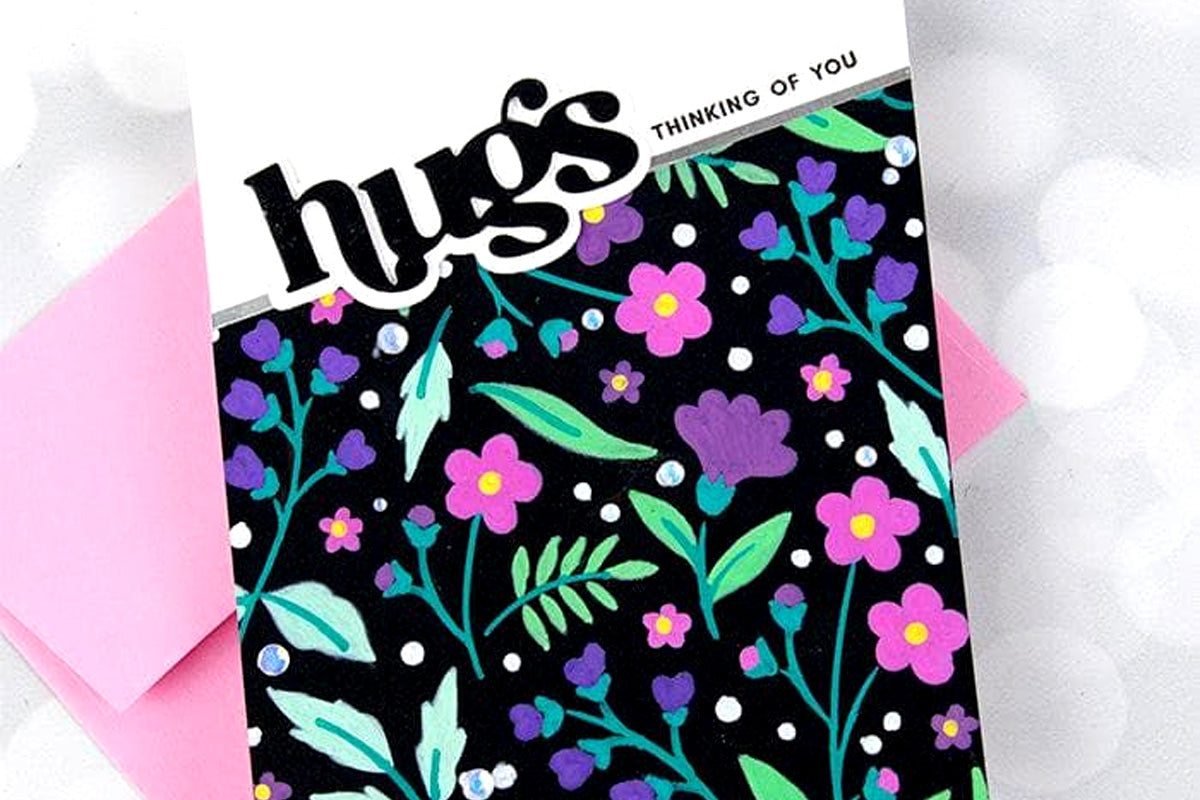 A "hugs" card created with Altenew's Acrylic Markers Vol.1 set by Jennifer McGuire