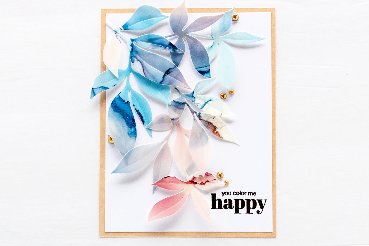 Clean and simple handmade greeting card decorated with alcohol inked die-cut leaves