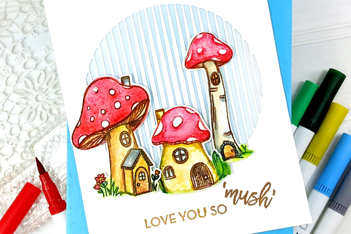 Cute mushroom houses on a Valentine's Day card with the punny sentiment "love you so mush"