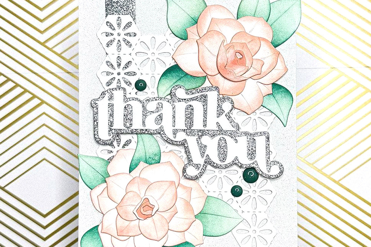 A thank you card with two lovely floral blooms as focal points and embellished with Altenew's Moonlit Silver Glitter Tape
